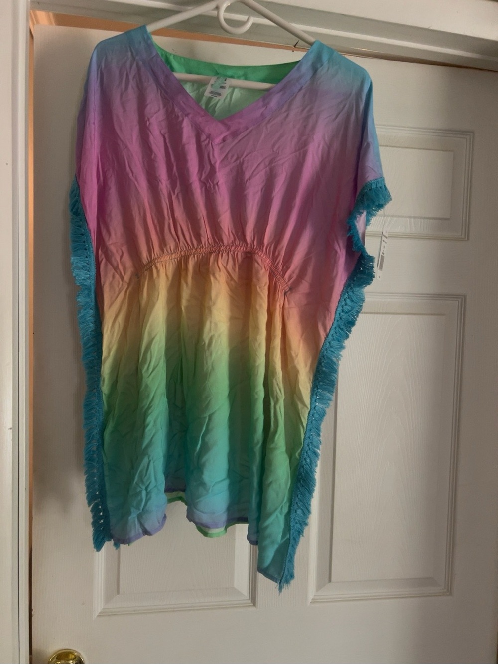 New with tags Breaking Waves girls’ swim cover-up in size 14.